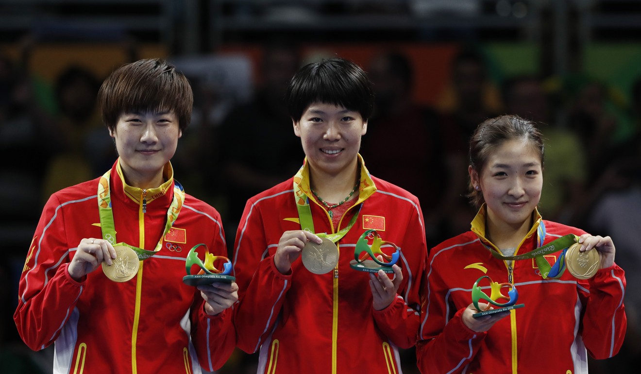(From left) China’s Ding Ning, Li Xiaoxia and Liu Shiwen sweep the medals at the 2016 Rio Olympic Games. Photo: Xinhua
