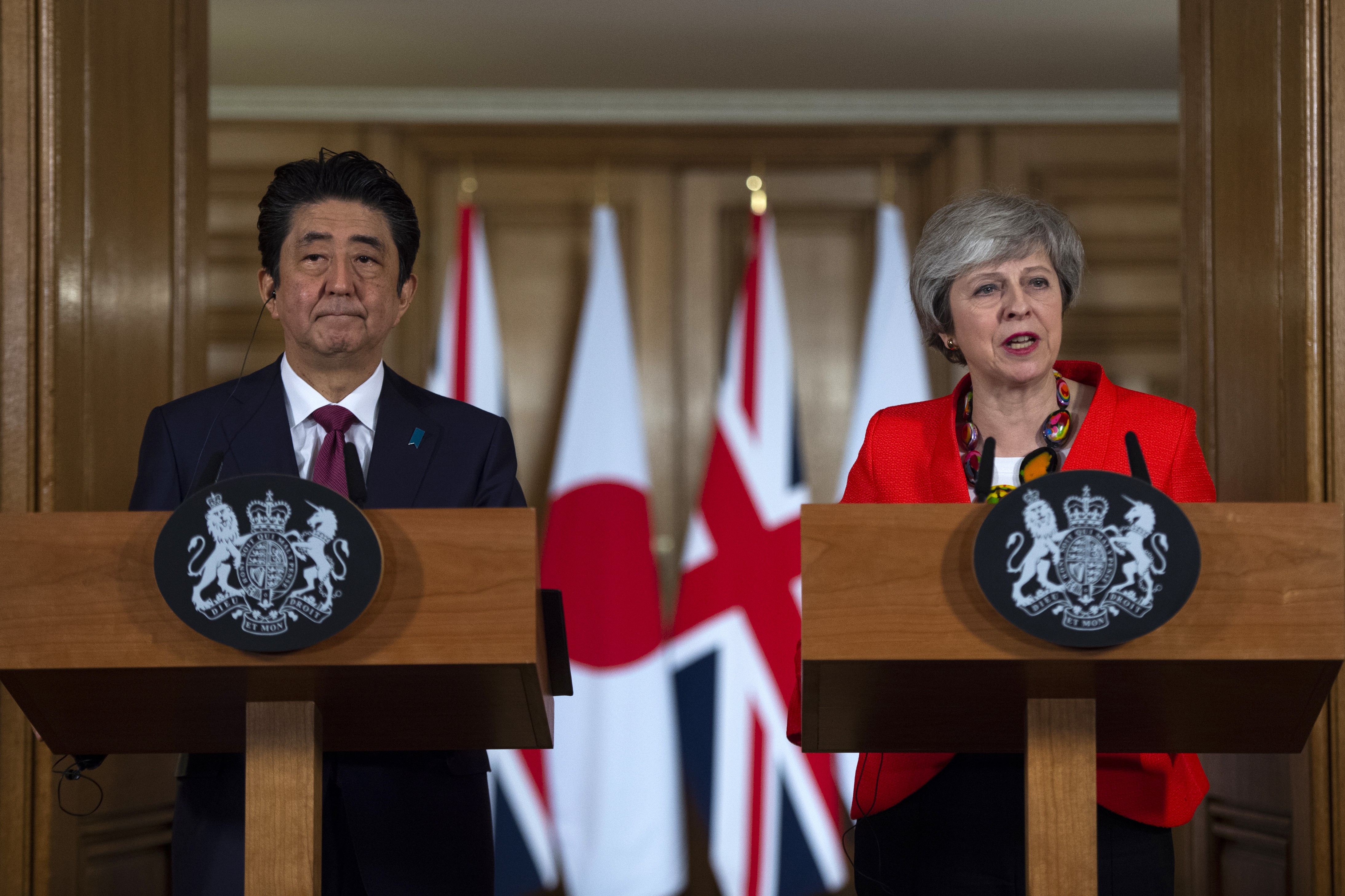 UK Prime Minister Theresa May speaks while Japan’s Prime Minister Shinzo Abe listens during their joint news conference in London on January 10. Britain’s attempts at negotiating a post-Brexit trade deal with Japan hit a roadblock when Tokyo expressed frustration with UK officials’ negotiation tactics. Photo: Pool via Bloomberg