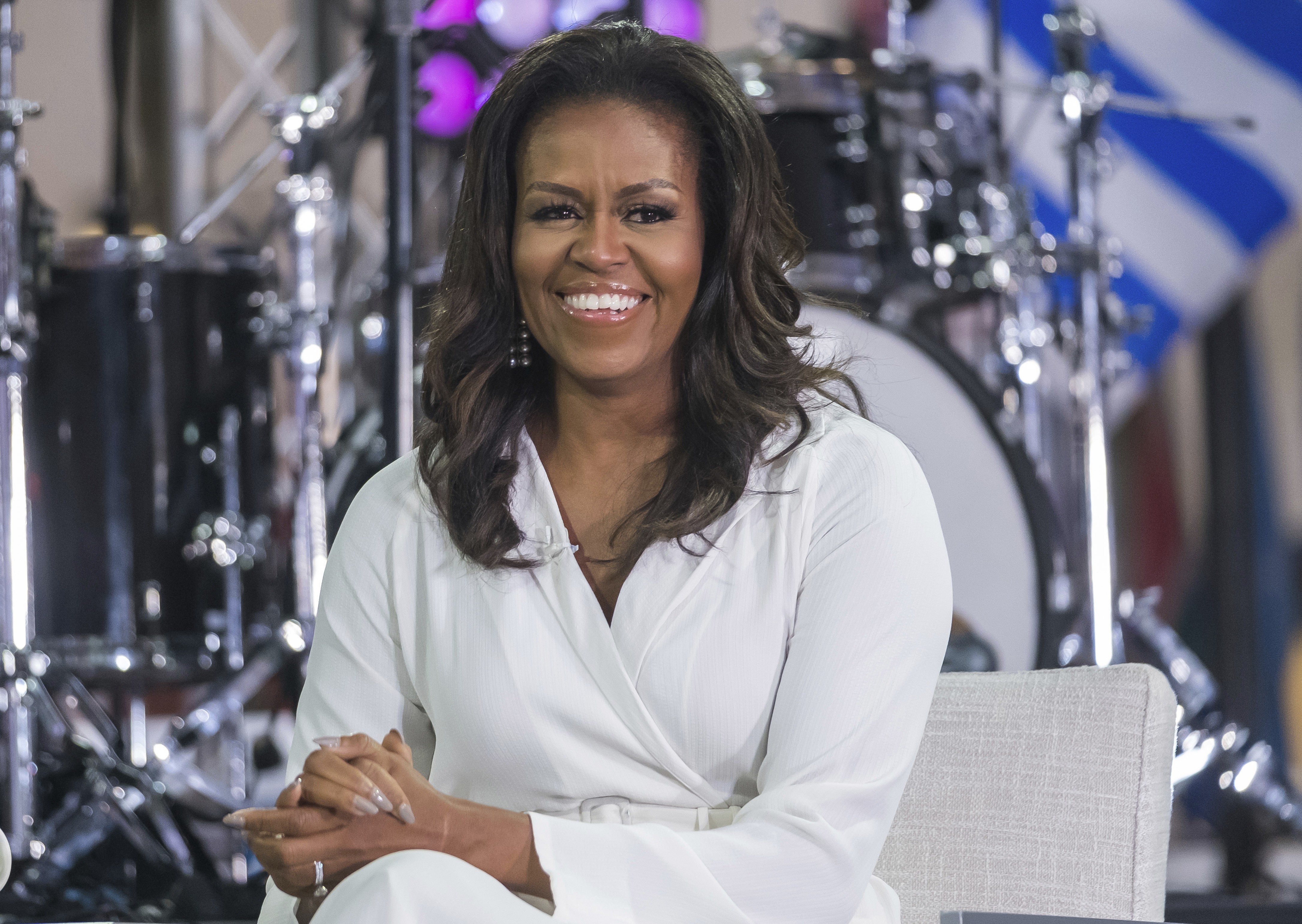 Former first lady Michelle Obama is said to be an advocate of collagen, could that what gives her skin its glow? Picture: AP