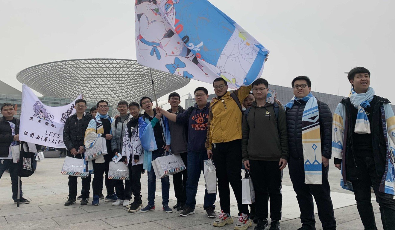 Luo’s fans stand outside her concert, banners at the ready. Photo: SCMP via Jane Zhang
