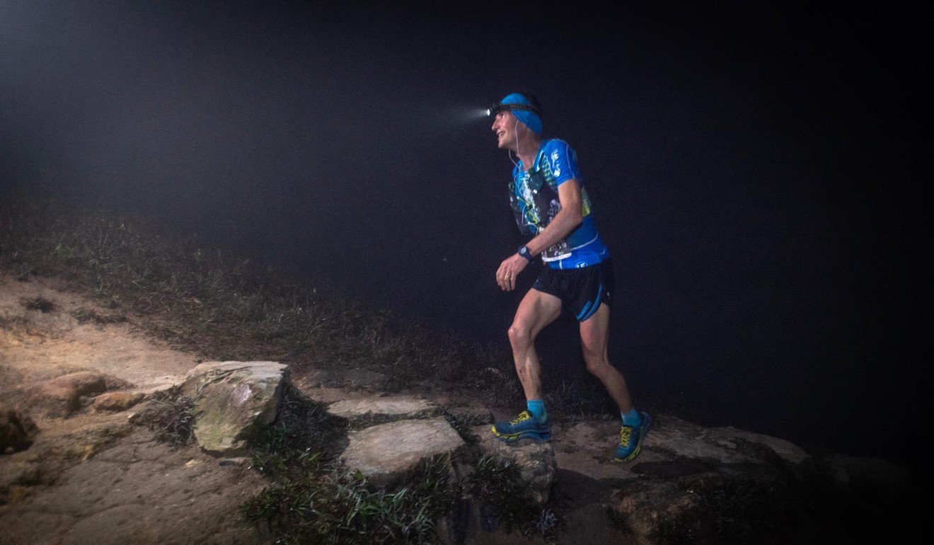 Antoine Guillon negotiates his way with a headlamp. Photo: Sunny Lee