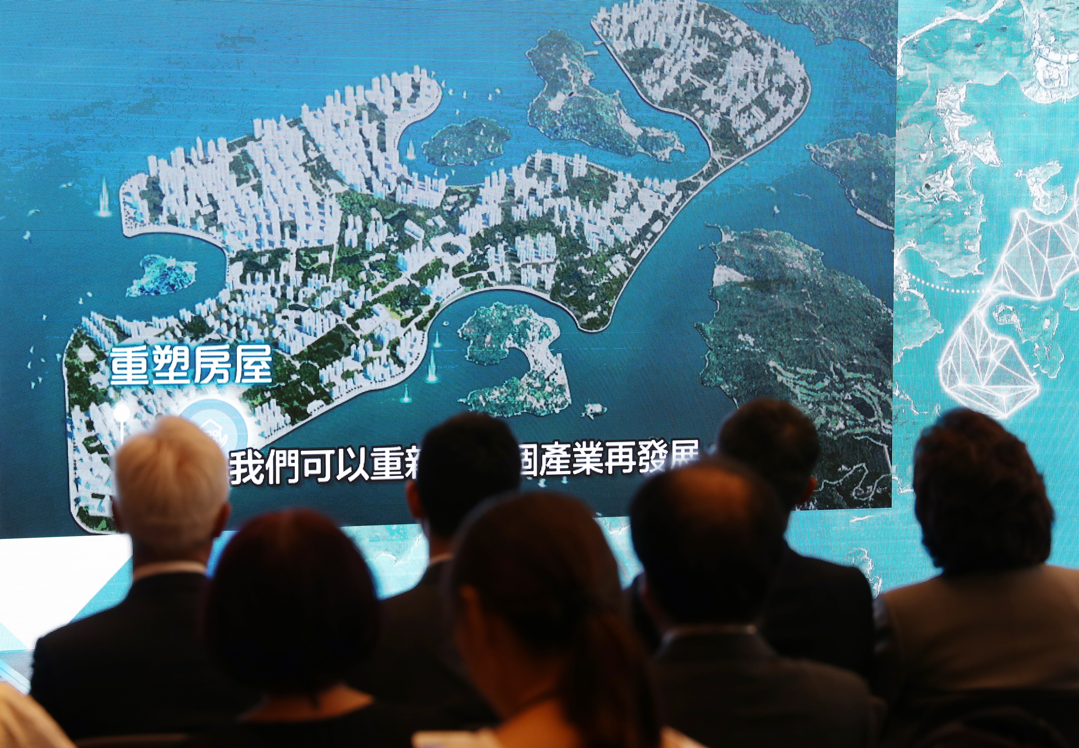 A presentation slide is shown during a press conference on the East Lantau metropolis project, proposing the reclamation of 2,200 hectares for housing to the east of Lantau Island. Photo: K.Y. Cheng