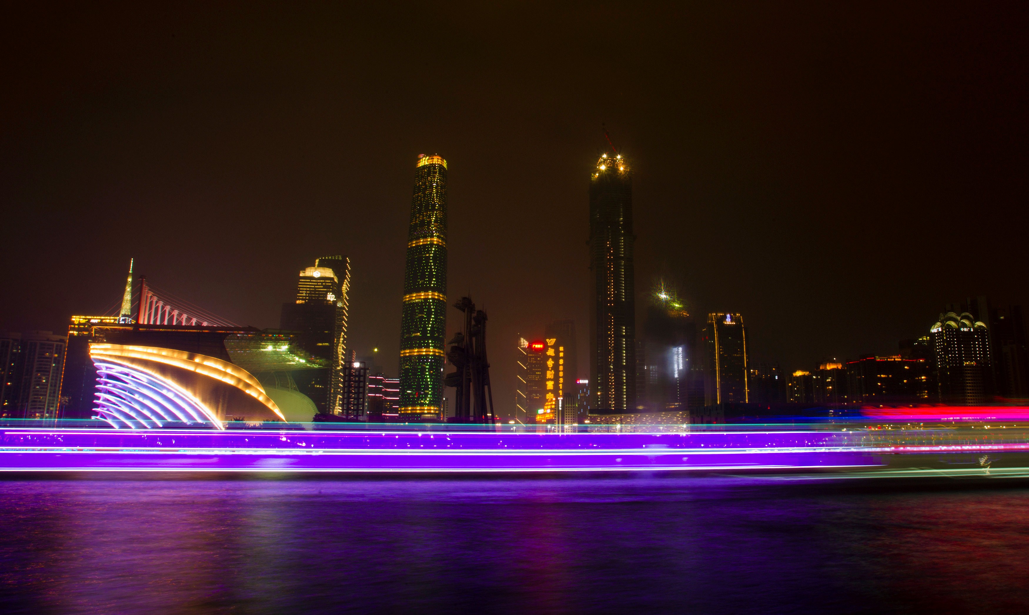 A long-exposure photo of boats passing a business area along the Pearl River in Guangzhou, Guangdong province. The Greater Bay Area plan puts Hong Kong in a stronger position to finance and collaborate with Shenzhen’s and Guangzhou’s innovative and internationally minded hi-tech manufacturing and services sectors. Photo: Reuters