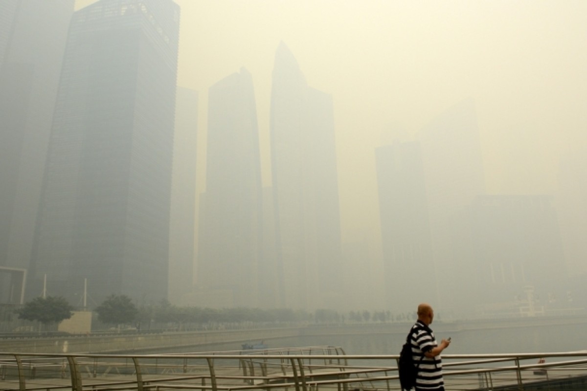 Singapore threatens legal action against local firms blamed for smog