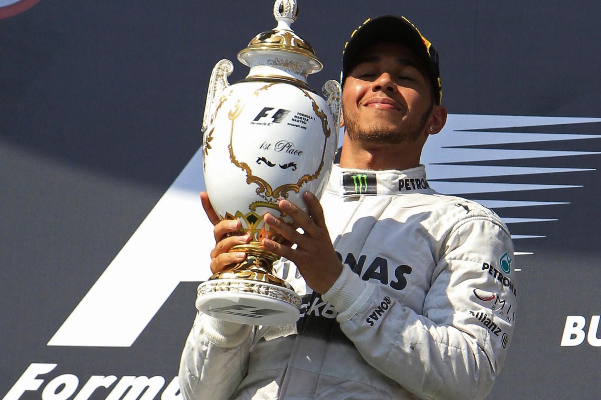 Briton Lewis Hamilton lands fourth Hungarian GP trophy for Mercedes ...