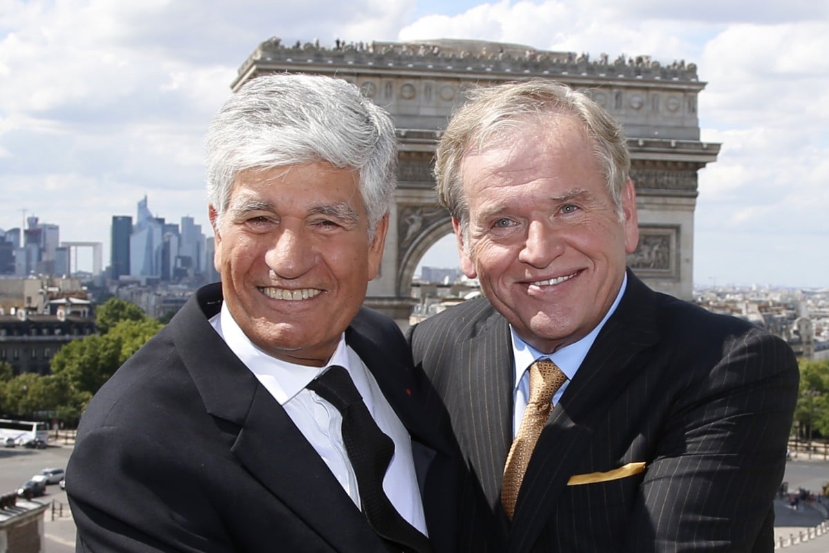 Publicis chief executive Maurice Levy (left), and Omnicom boss John Wren plan a merger to create the world's biggest advertising group . Photo: AP
