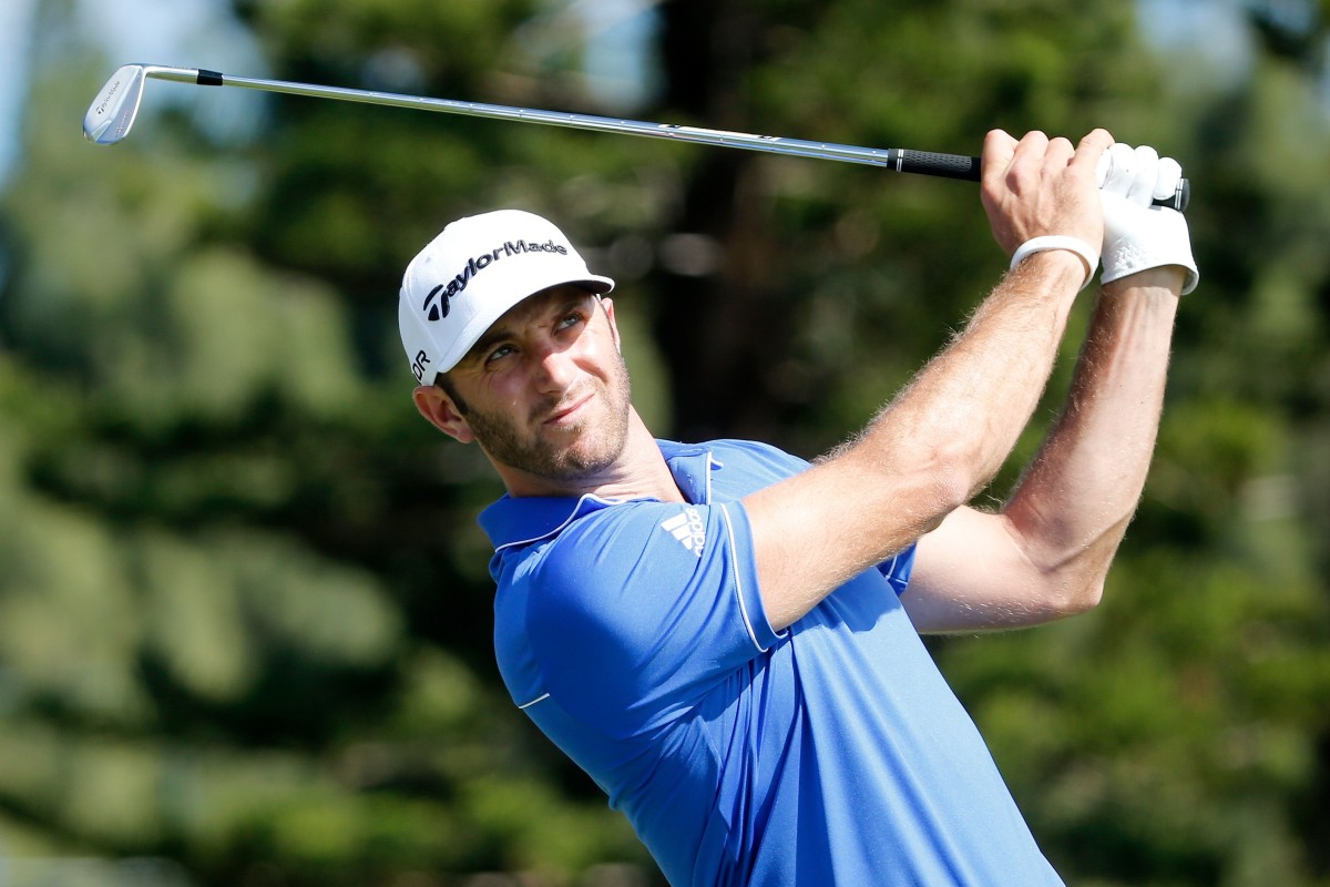 Dustin Johnson stays in contention for title defence ...