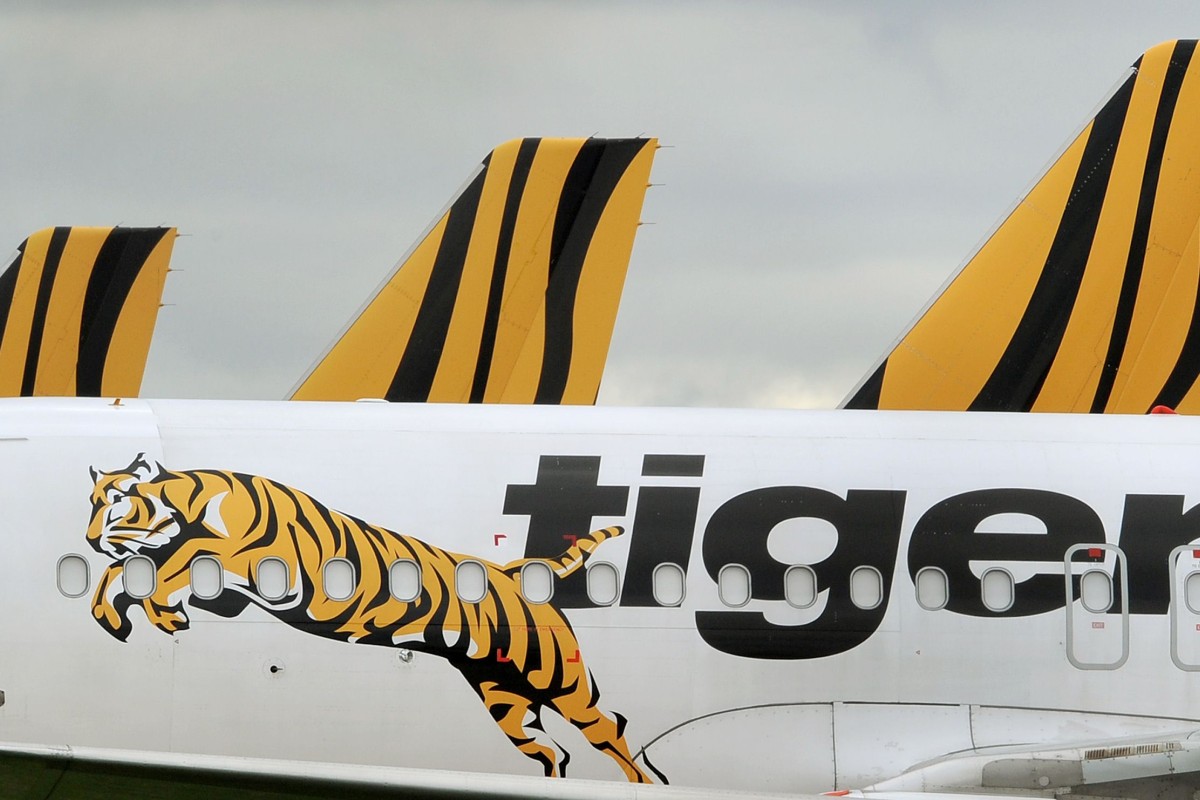 People Walking Naked On Beach - Tiger Air shares fall on news of fundraising plan | South ...