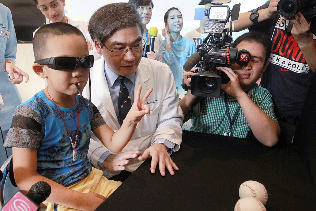 Blind BinBin gets futuristic glasses to help him 'see' via pulses on