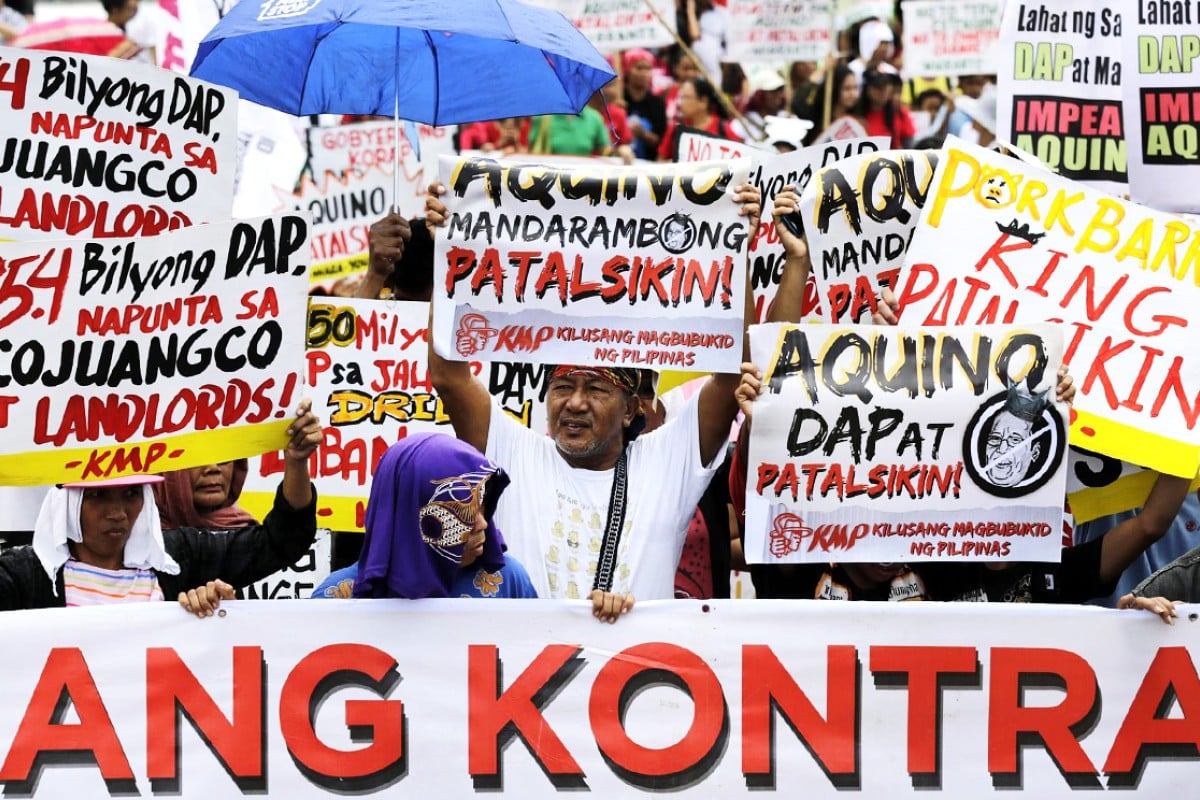 Manila protest against 'pork barrel' funds and second term for Aquino