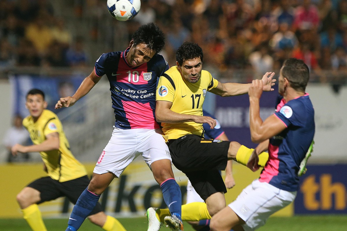 Kitchee's Lam Ka-wai (left) and Nabeel Sabah Zghair of Arbil FC from Iraq compete for a header in their AFC Cup semi-final. Photo: K. Y. Cheng