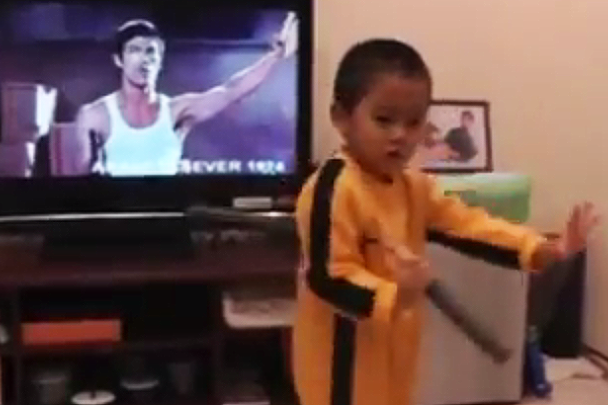 little kid bruce lee nunchucks