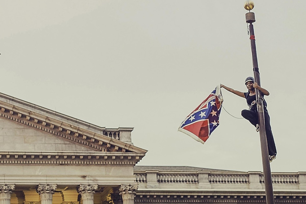 Activist Takes Down Confederate Flag Outside South Carolina Capitol South China Morning Post