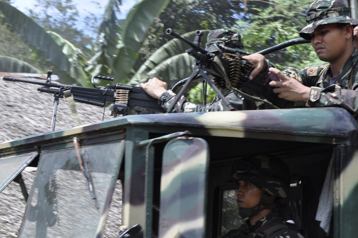 Bomb blast on bus in Philippines by suspected Abu Sayyaf militants ...