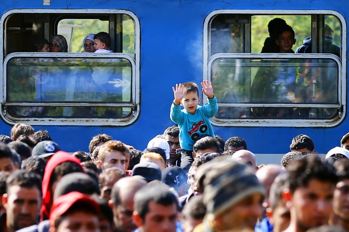 European ministers vote to find homes for refugees across the continent