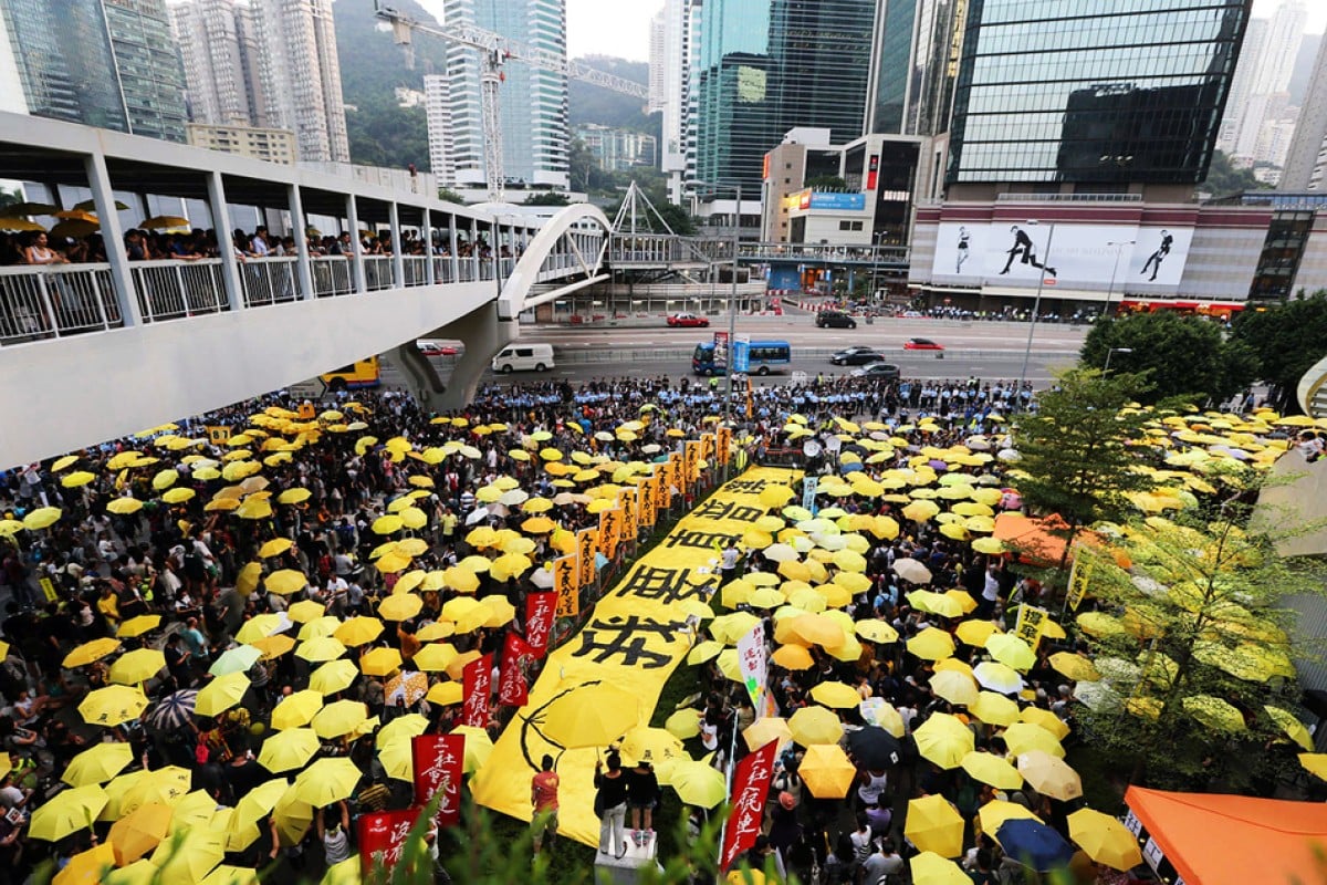 Yellow ribbons, umbrellas return as Hong Kong marks first anniversary of Occupy at onceoccupied
