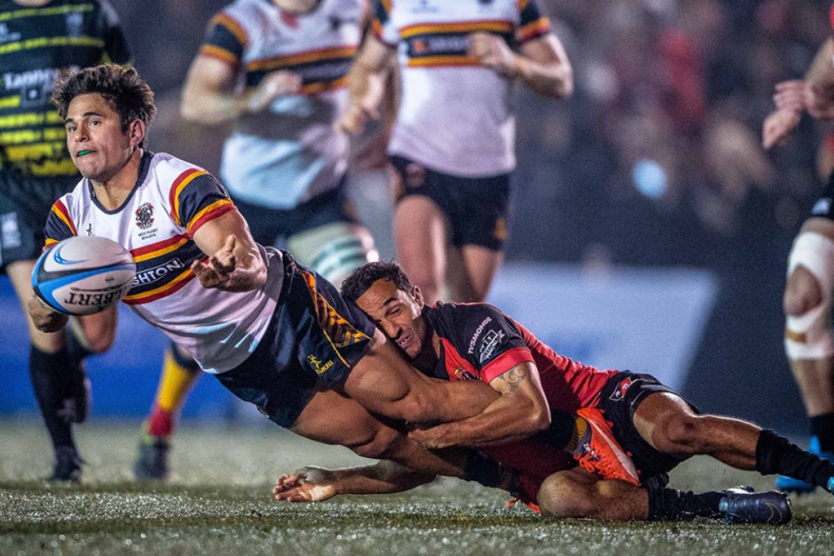 Valley fly-half Ben Rimene corrals HKCC winger Rowan Varty en route to the HKRU Premiership champions’ 21-5 final victory in the Grand Championship on Saturday. Photos: HKRU