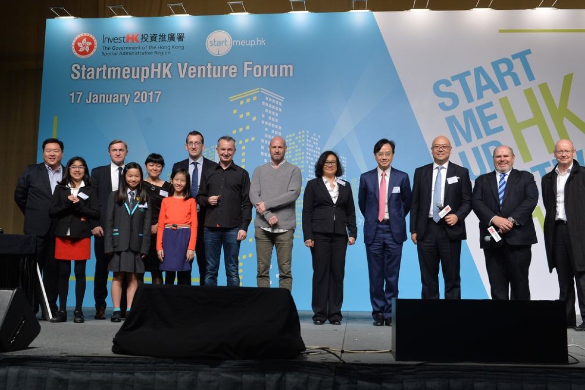 Picture shows the Acting Director-General of InvestHK, Mr Charles Ng (third right), with speakers at the StartmeupHK Venture Forum on January 17.