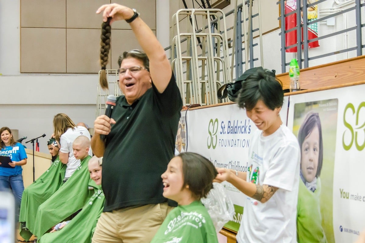 HKIS Students Go Under Razor for Kids’ Cancer Research