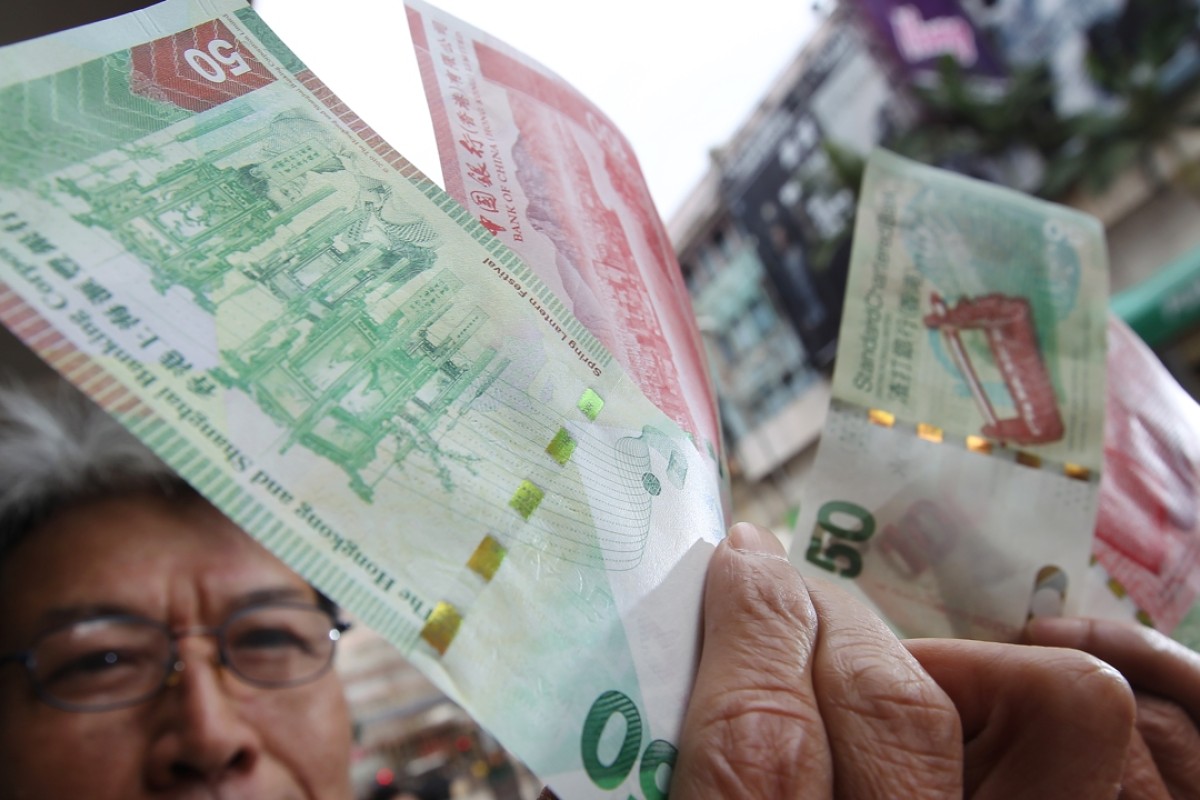 Hong Kong’s dollar peg safe from attacks by speculators seeking ro