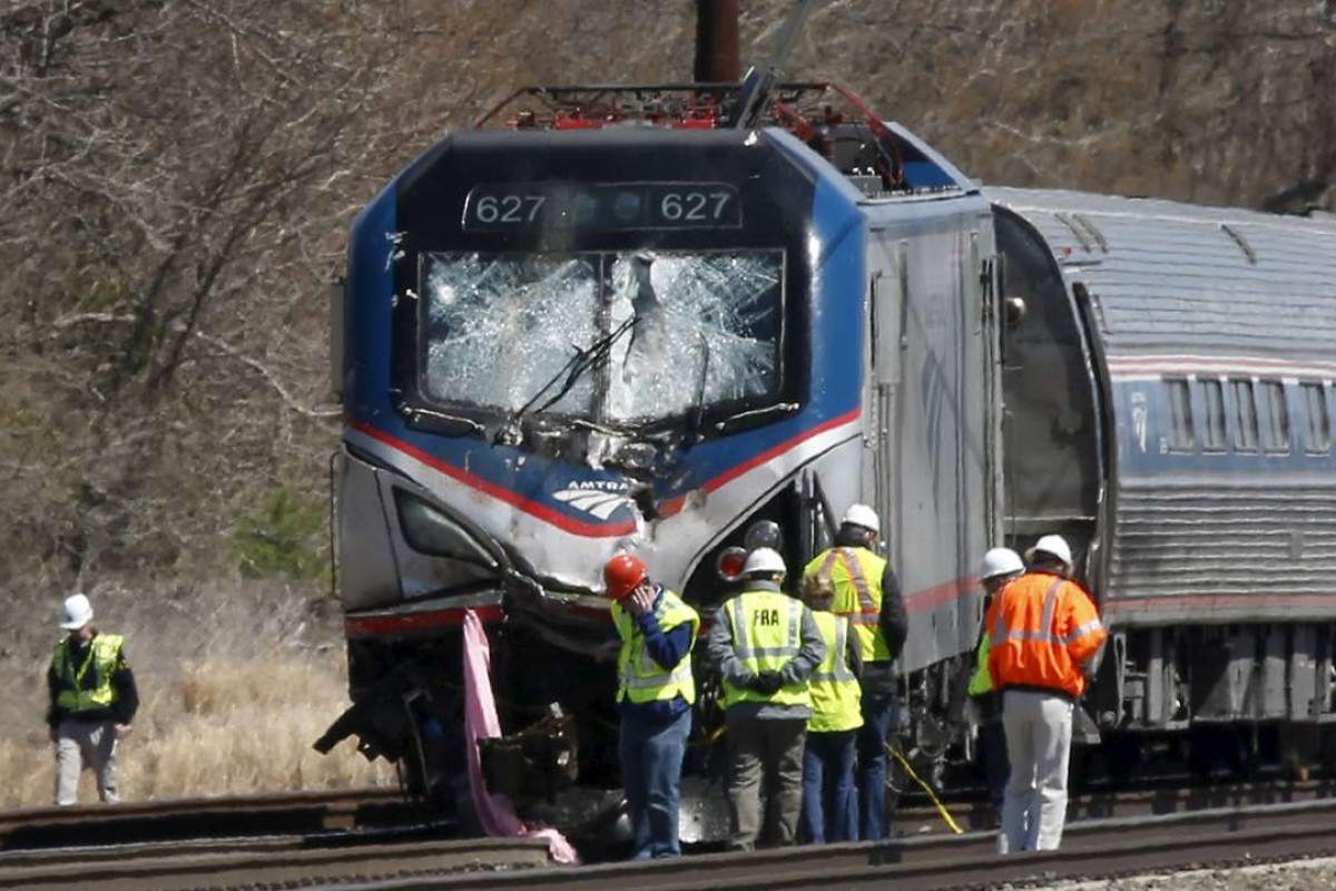 Two dead after Amtrak train smashes into backhoe on tracks near