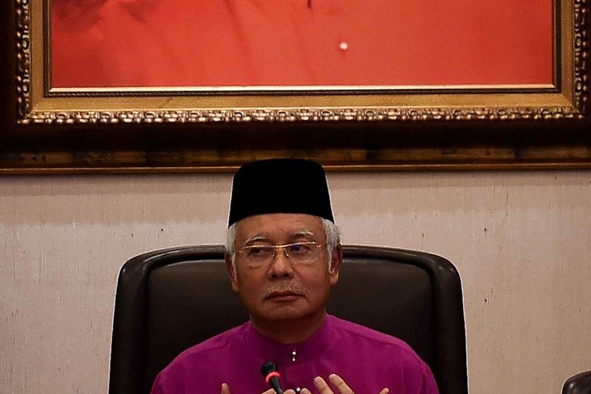 Malaysia’s ruling party vicepresident quits amid raging 1MDB row