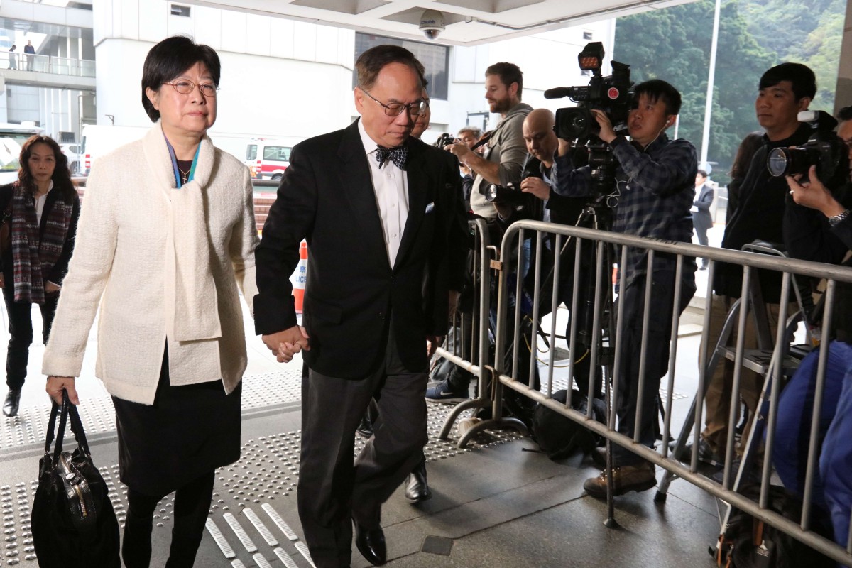 Former chief executive Donald Tsang accompanied by his wife Selina Tsang outside the High Court this morning. Photo: Felix Wong