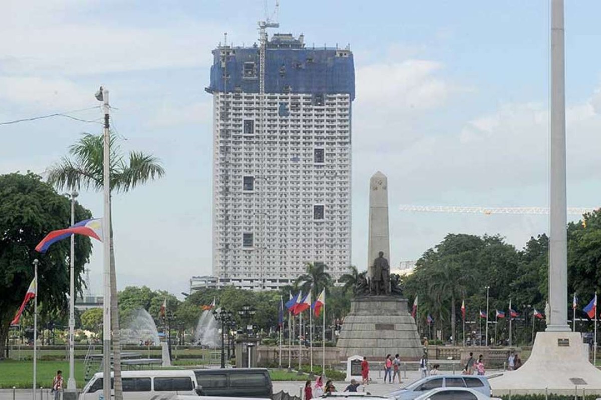 Construction To Resume On Manila S Photobomber Apartment Building After Conservationists Lose Bid To Tear It Down