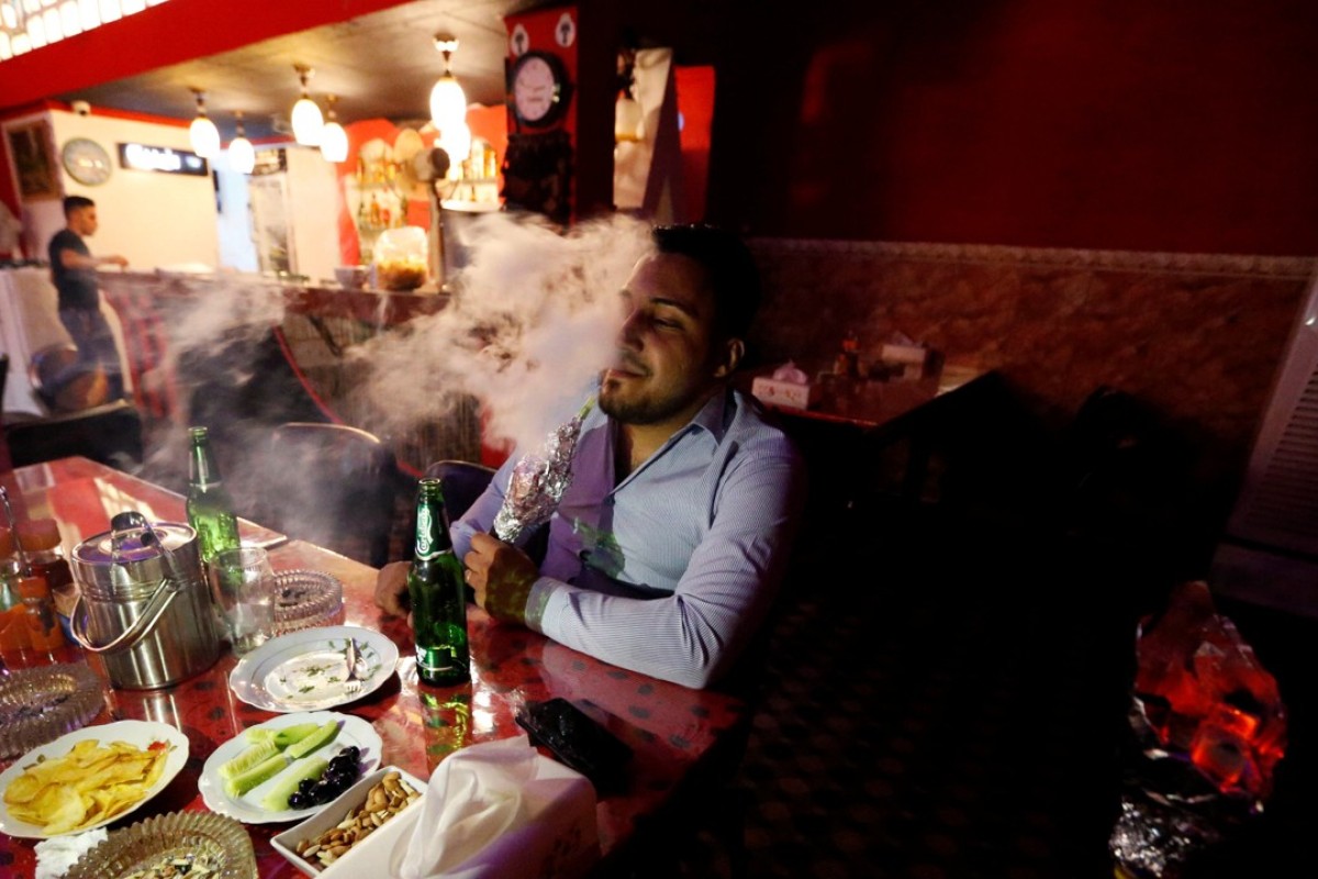 Shisha and a drink over lunch: first bar opens in Iraq town liberated ...