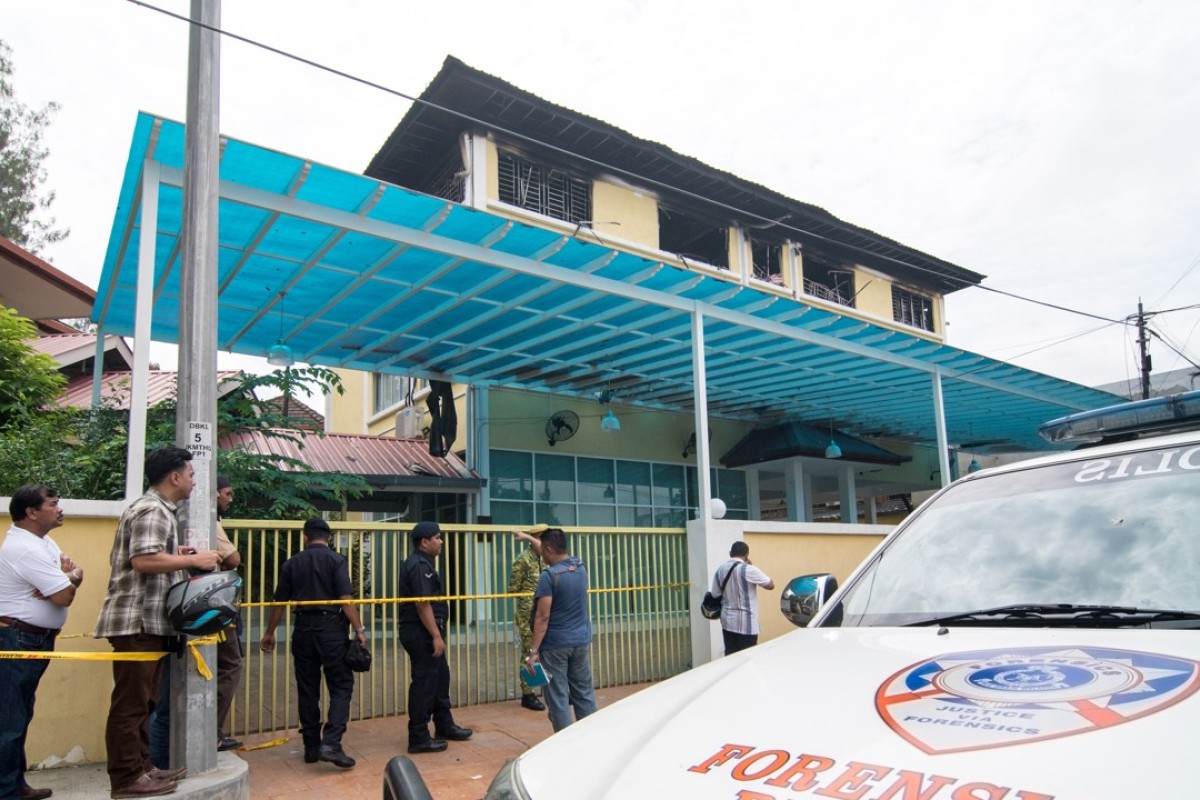 Malaysia probes if deadly school fire was caused by gas ... - 