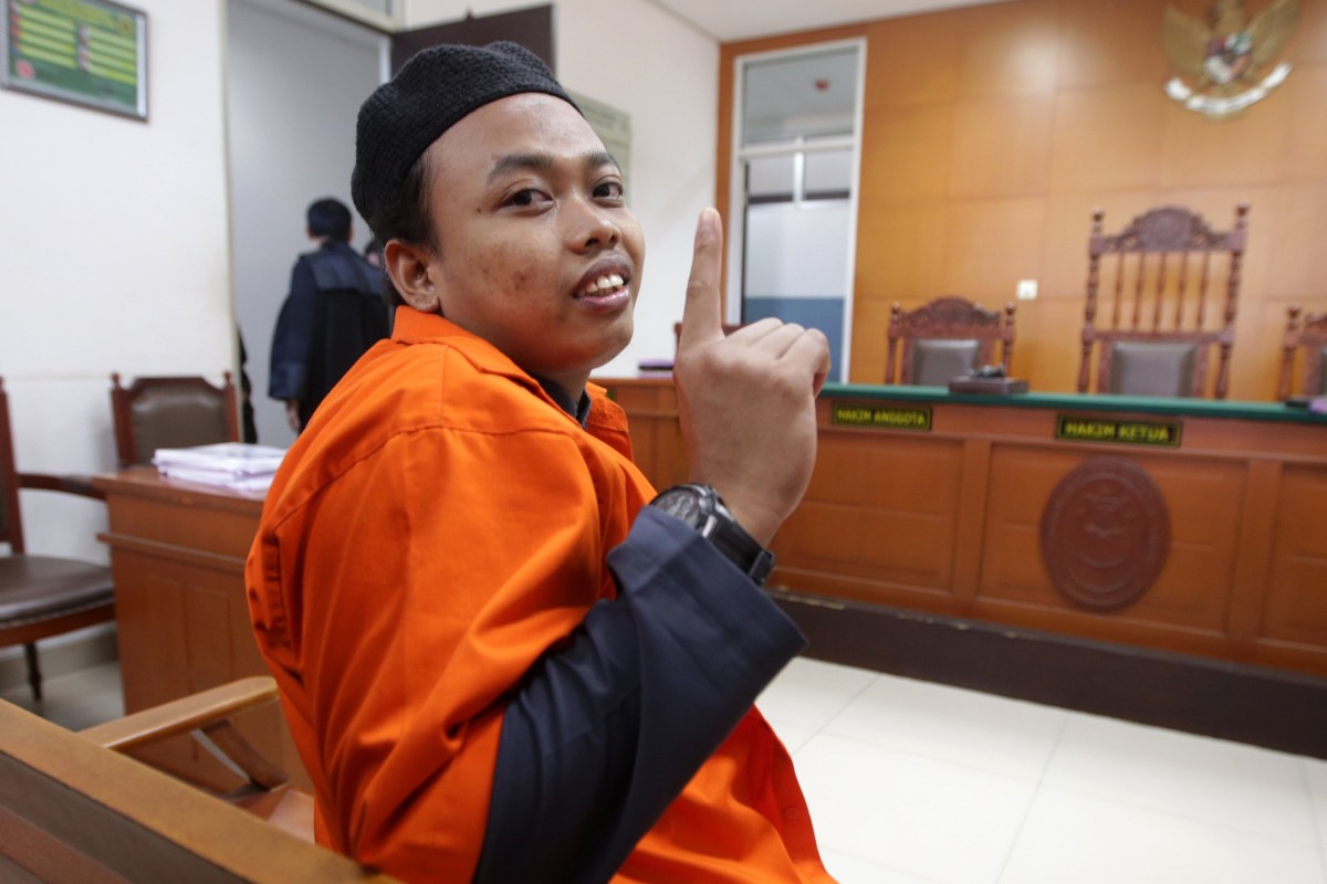 Muhammad Nur Solihin before his trial in Jakarta. Photo: EPA