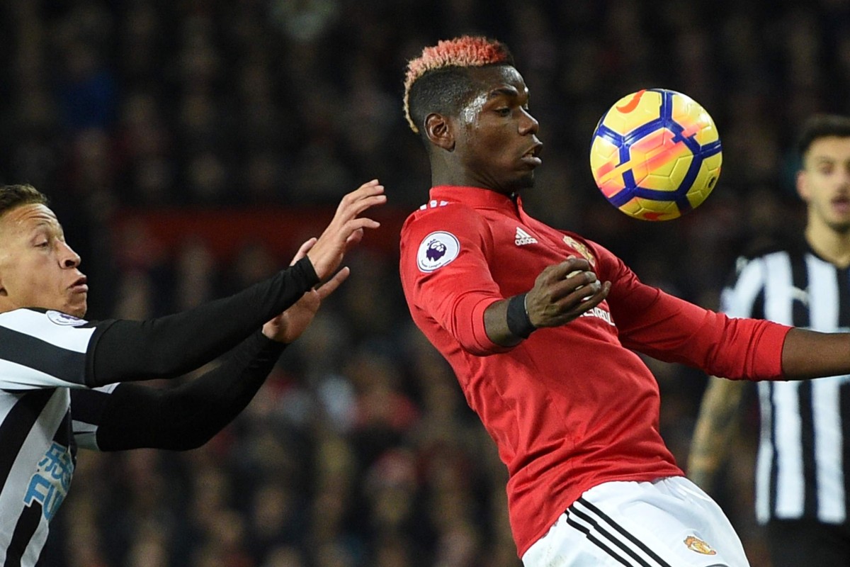 Paul Pogba (right) is back from injury and made an immediate impact against Newcastle. Photo: AFP