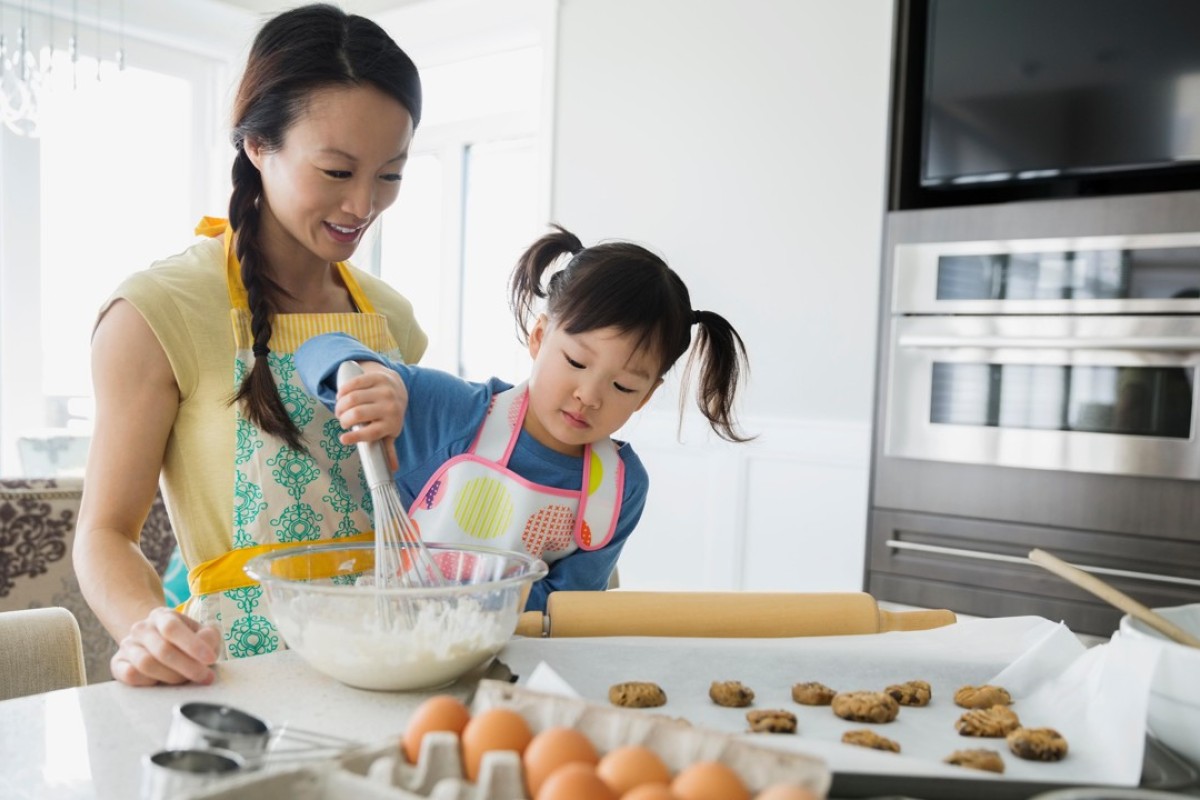 Getting children involved in kitchen activities at an early age is a good way to build an interest in self-prepared food. Photo: Alamy