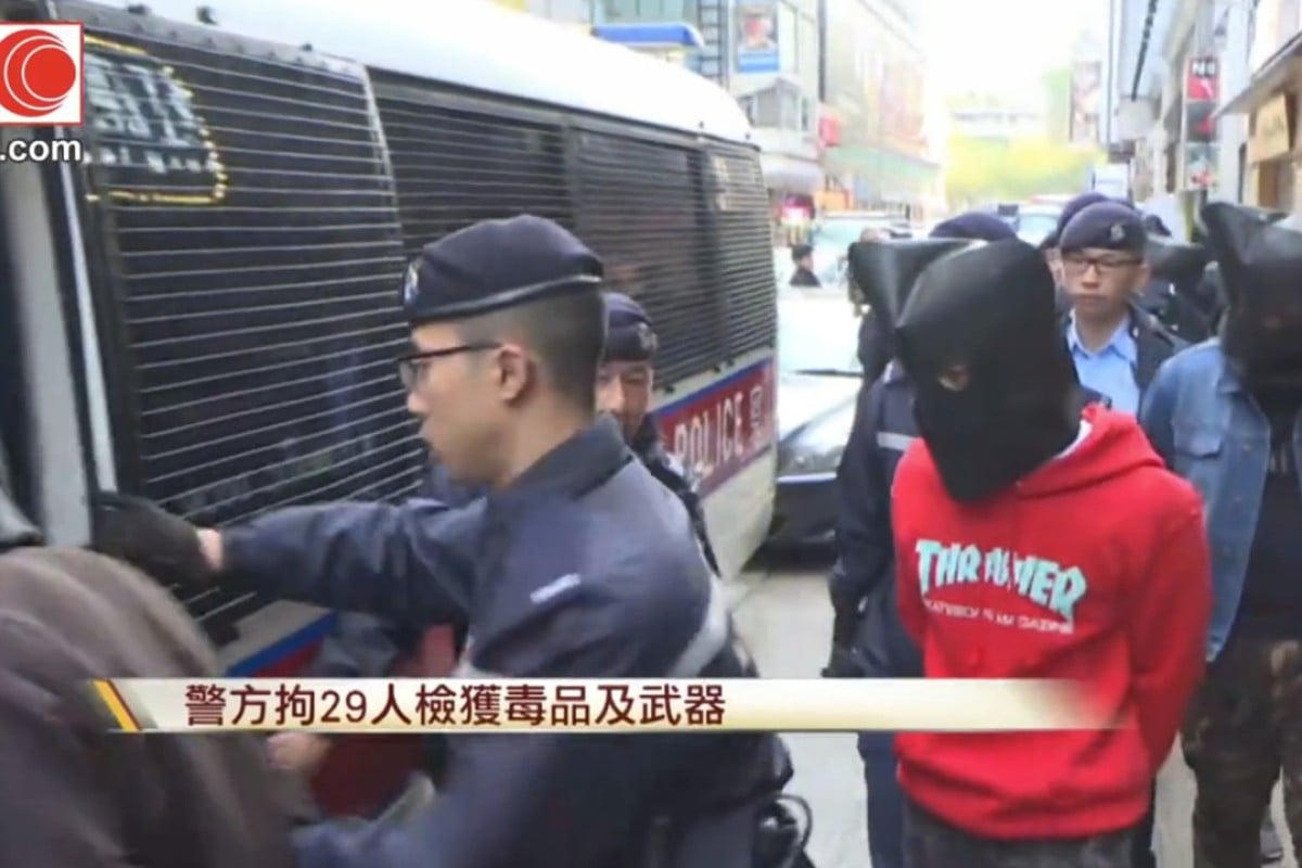 Hong Kong Police Arrest 29 In Christmas Day Raid On Suspected Triad Bar ...