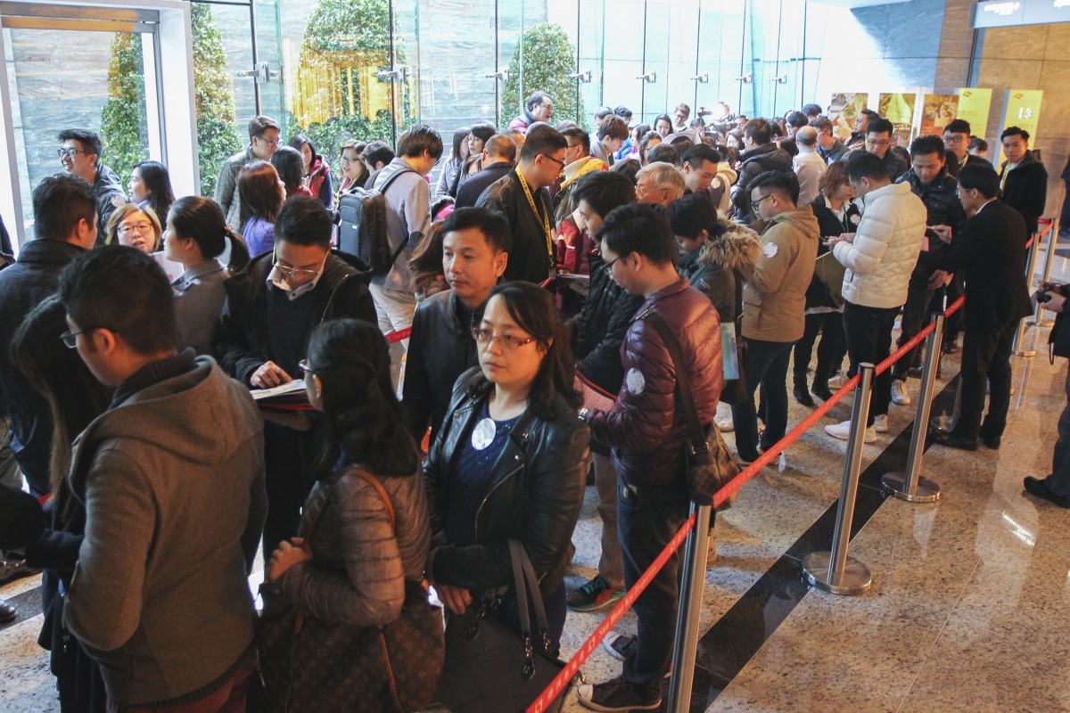Buyers queue up at Sun Hung Kai Properties’ launch of its St Barths apartment complex at the International Commerce Centre (ICC) in West Kowloon. Photo: SCMP / Roy Issa