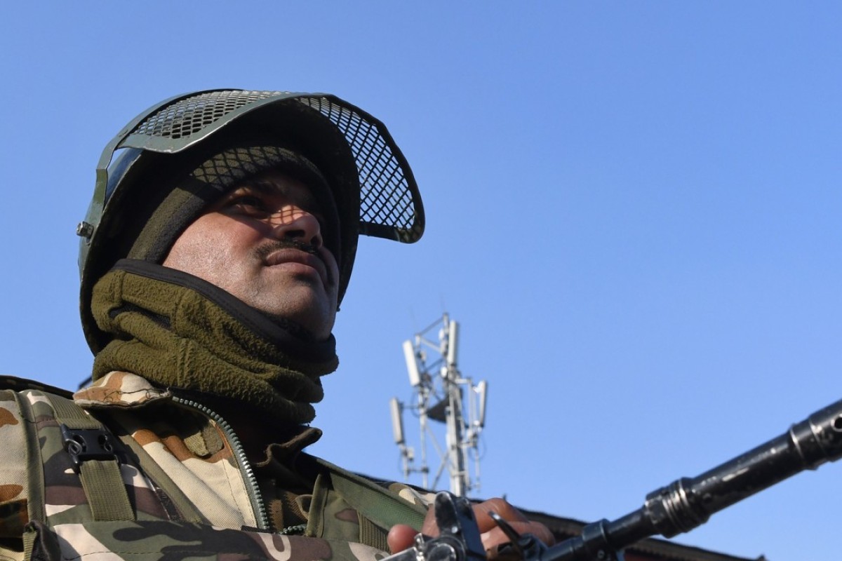 An Indian paramilitary trooper is seen in Kashmir on Monday. The country is investing US$553 million into buying guns for border protection, six months after a stand-off with China on its borders. Photo: AFP