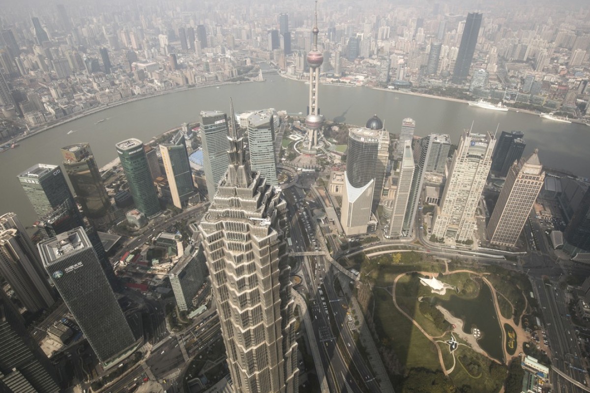 Shanghaiâ€™s core Lujiazui financial district with the Jin Mao Tower in the foreground and the Oriental Pearl Tower behind. Photo: Bloomberg