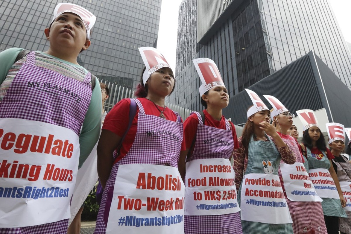 Domestic helpers on the march in Hong Kong to demand better living and