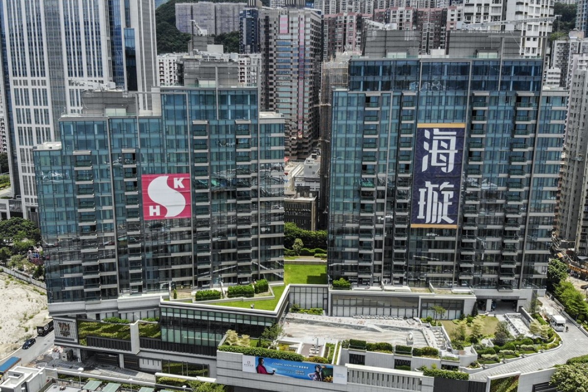 Developers race to exploit a loophole in Hong Kong's vacancy ... - 
