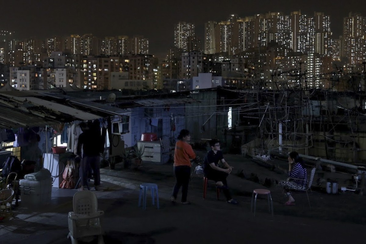 Residents living in illegal cubicle homes on Sing Win Factory industrial building’s rooftop in Kwun Tong. Photo: Dickson Lee