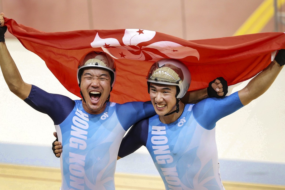Cyclists Cheung King-lok () and Leung Chun-wing celebrate victory. Photo: Hong Kong Olympic Committee