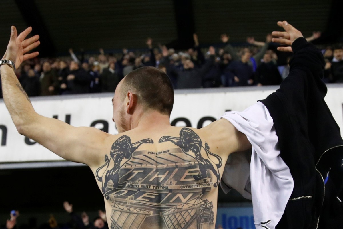 Millwall fans celebrate beating Everton. Photo: Reuters