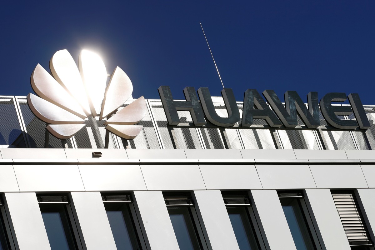 The logo of China's Huawei Technologies shines over the German headquarters of the telecommunications giant in DÃ¼sseldorf. Photo: Reuters