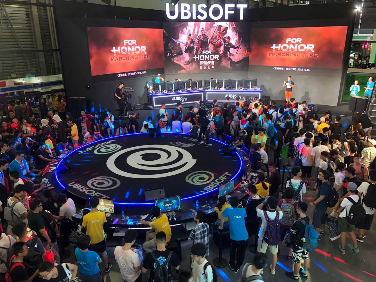 Ubisoft has an amphitheater set up inside their booth for gamers to compete on stage.