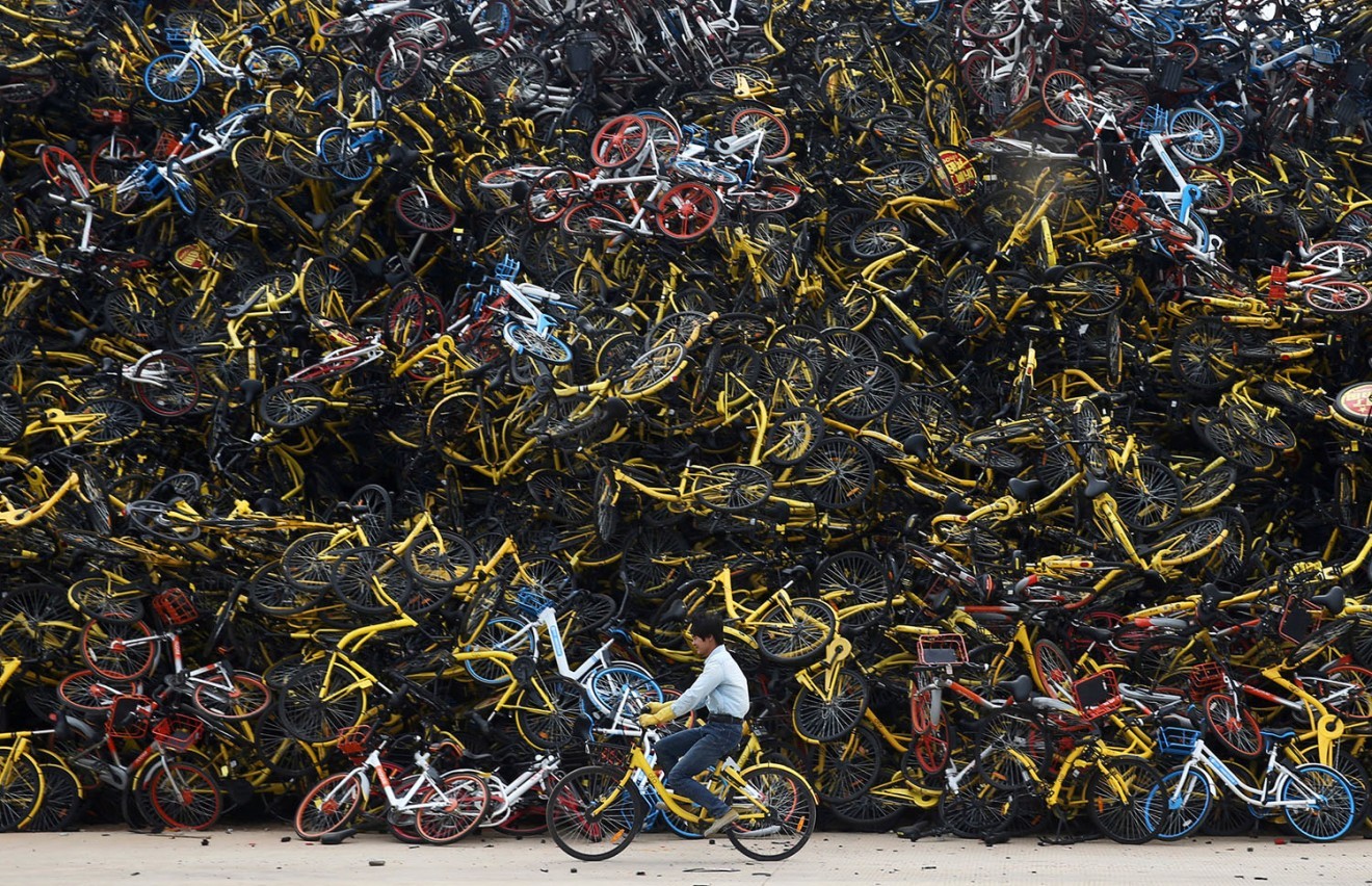 Piles of dumped bikes can be seen in many Chinese cities. (Picture: Bloomberg)