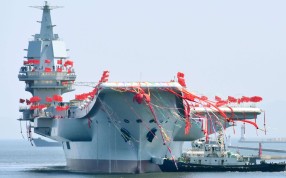 China's first domestically built aircraft carrier, the 50,000-tonne Shandong, is launched at a shipyard in the northeastern port city of Dalian. Photo: Kyodo China's first domestically built aircraft carrier, the 50,000-tonne Shandong, is launched at a shipyard in the northeastern port city of Dalian. Photo: Kyodo