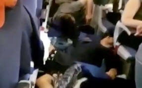 Passengers lying on floor and debris in plane cabin on board an Aeroflot Boeing 777 flight from Moscow to Bangkok. Photo: Reuters