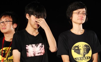 Joshua Wong (centre) protests against national education at a rally outside government headquarters, in Admiralty, in 2012. Picture: Felix Wong