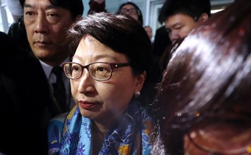 Secretary for Justice Teresa Cheng Yeuk-wah (centre) attends a Legislative Council meeting at the Legislative Council Complex in Tamar on Wednesday. Photo: SCMP / Winson Wong