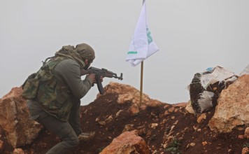 A Turkish-backed Syrian rebel fighter mans a monitoring point near the Syrian village of Qilah, on the southwestern edge of the Afrin region close to the border with Turkey, on Wednesday. Photo: AFP A Turkish-backed Syrian rebel fighter mans a monitoring point near the Syrian village of Qilah, on the southwestern edge of the Afrin region close to the border with Turkey, on Wednesday. Photo: AFP